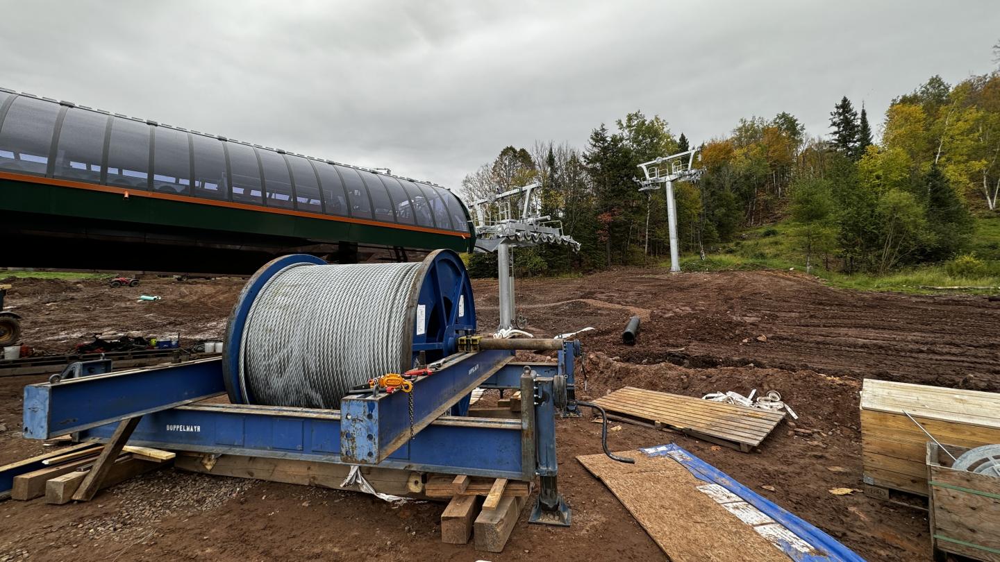 Spool of galvanized cable awaiting installation at bottom of chairlift. 